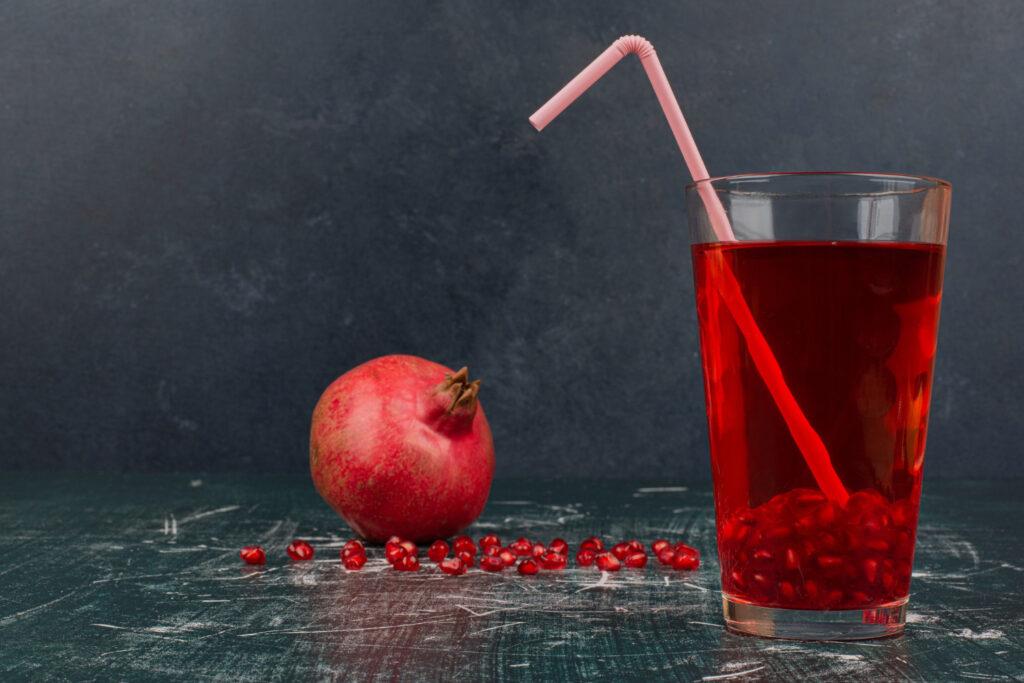 juice in a glass with straw
